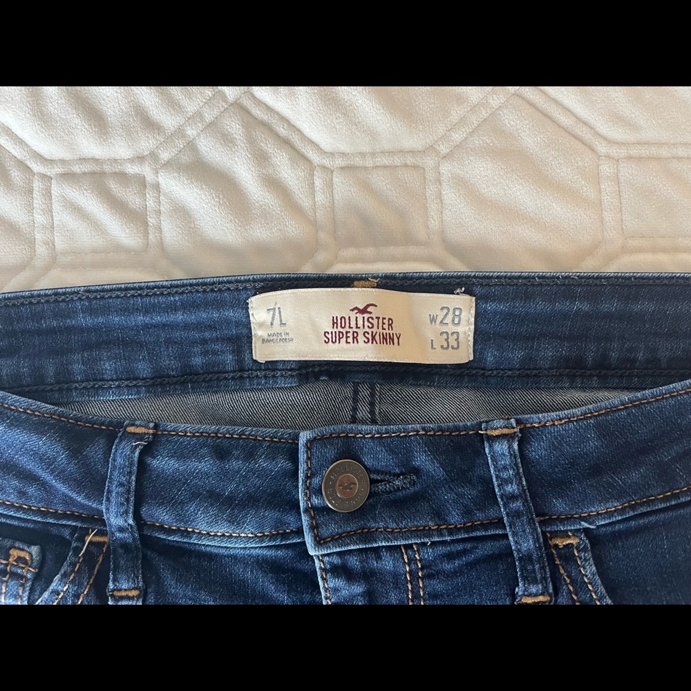 Dark blue low rise skinny jeans